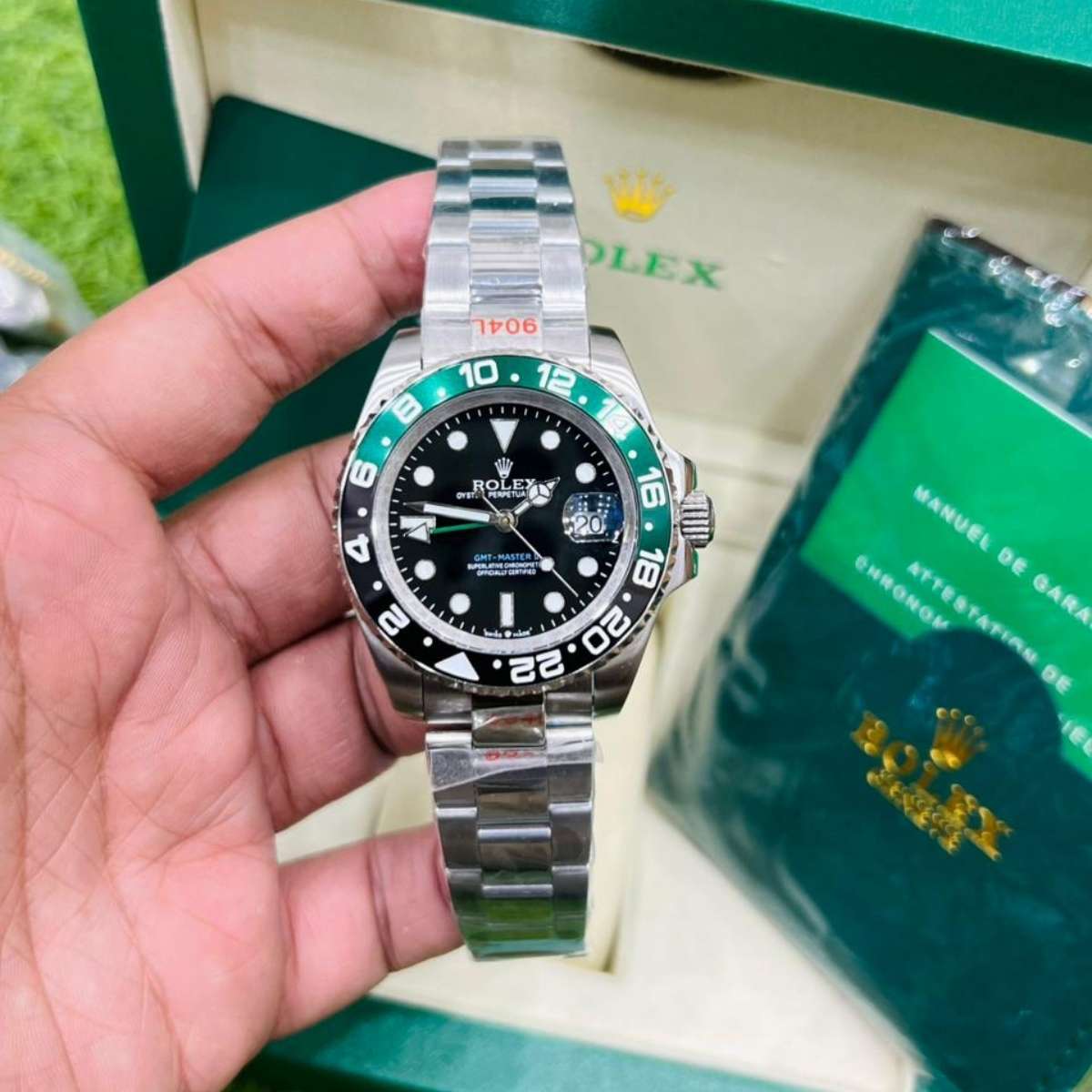 Rolex GMT-Master II Green-Black Bezel Black Dial